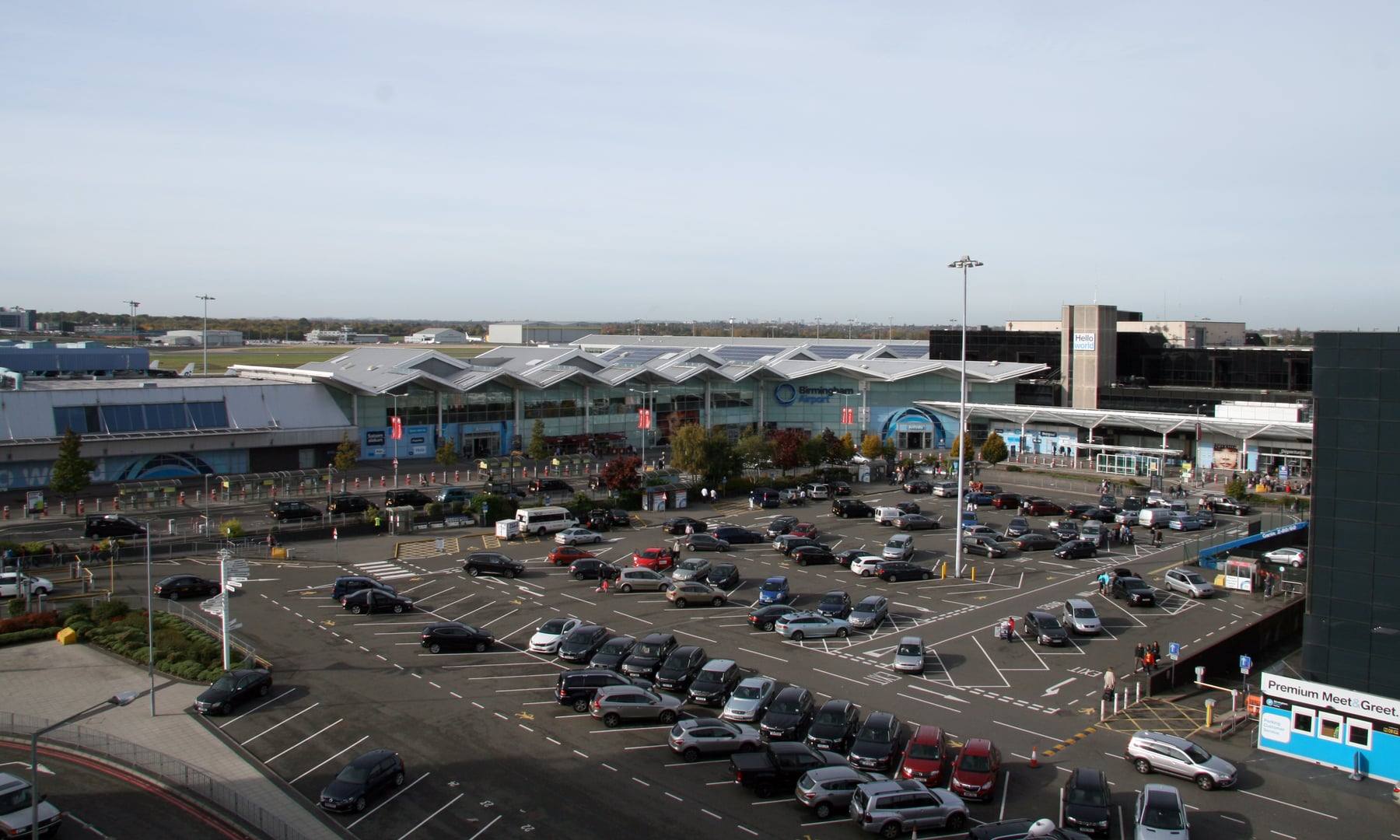 The terminal building at Birmingham Airport, with the pick-up forecourt and car park in front